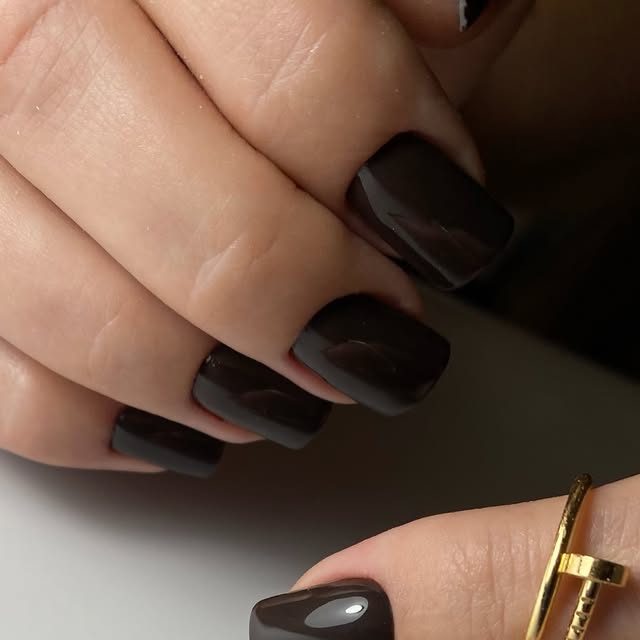 Dark glossy short manicure by Yuliia